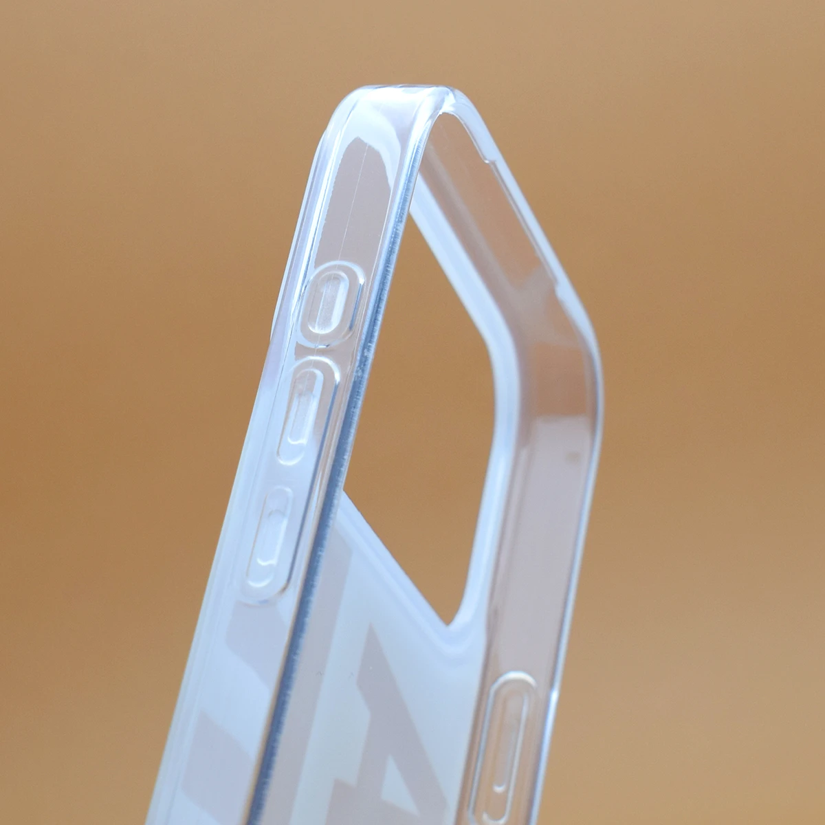 Closeup of iPhone 17 Pro TPU case orange design detail